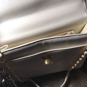 Beautiful white pocketbook with gold clasp like you